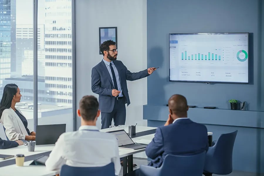 an erp consultant presenting results to a client